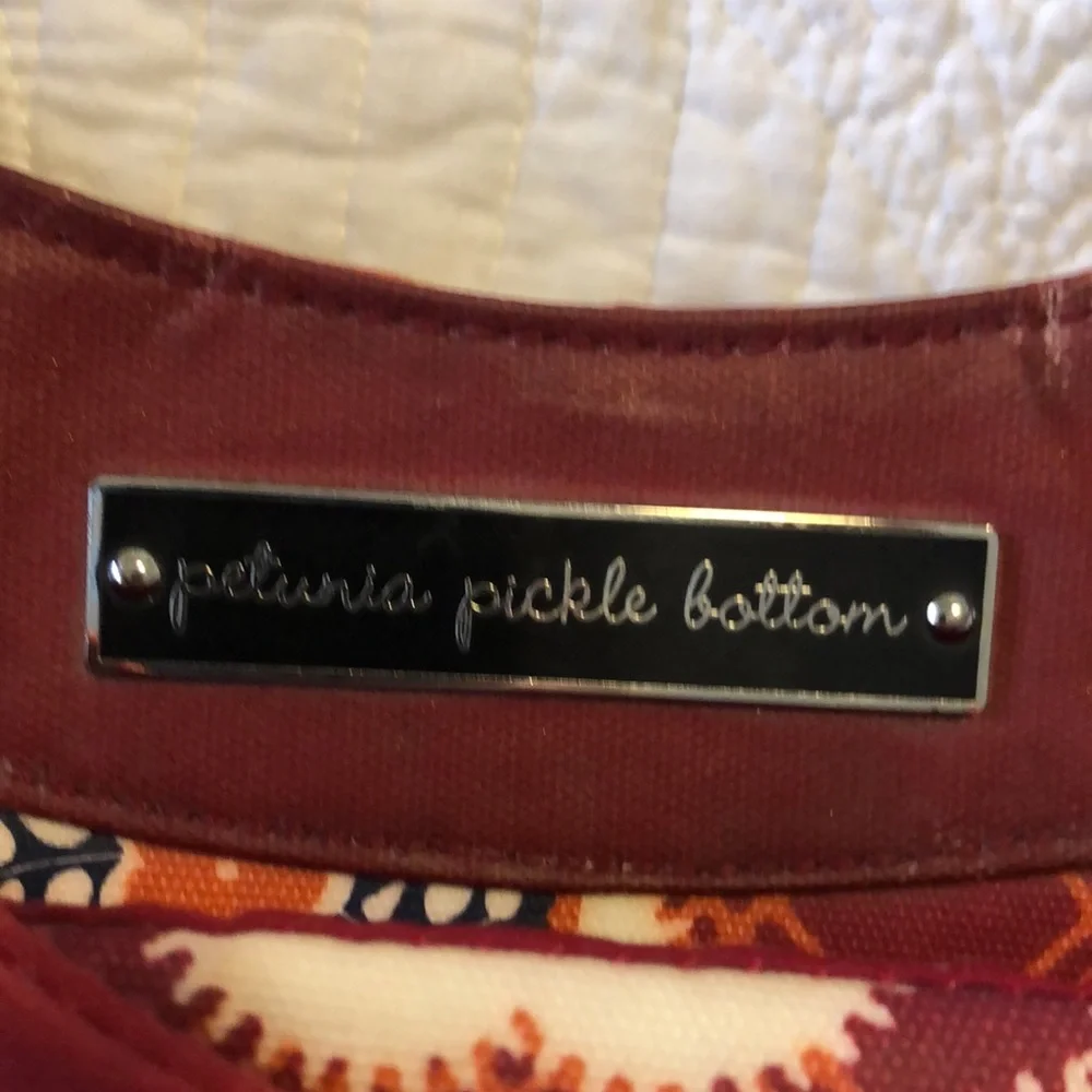 Petunia Pickle Bottom Red and Brown Kids Diaper Bag with Fold-Out Changing Pad